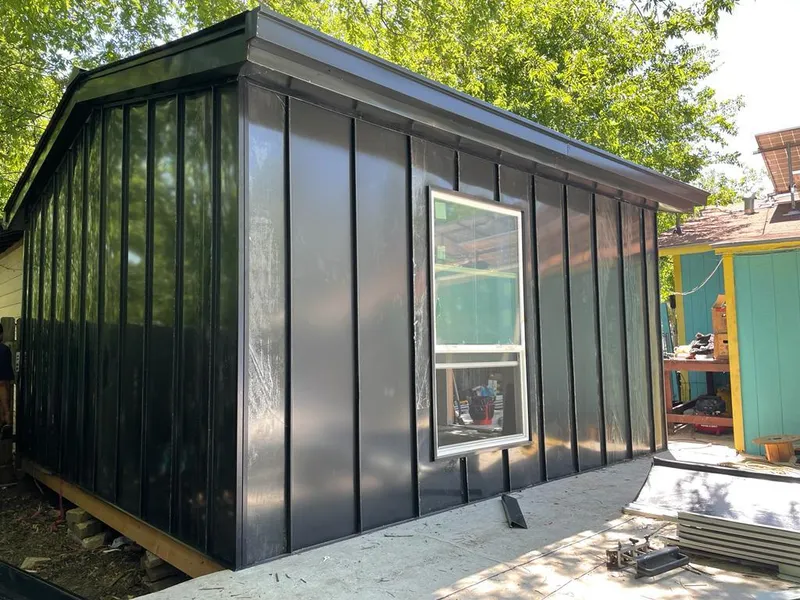 Black standing seam metal wall panels for Metal Roof Installation in West Deptford